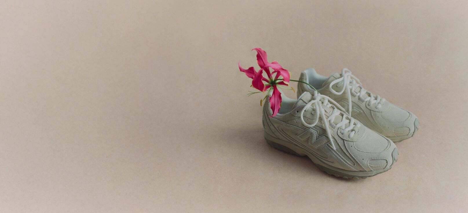 Still life studio shot of the 204L with red flower 